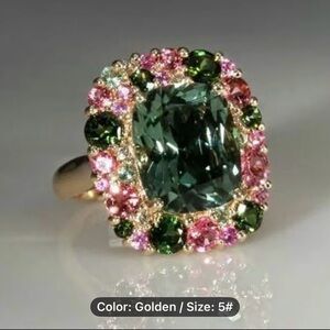 New without tags Gold Ring with Olive Green Center and Pink & Red Accent Halo